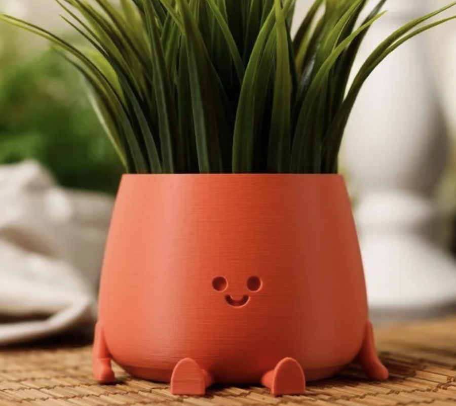 Sunny Side character planter in terracotta